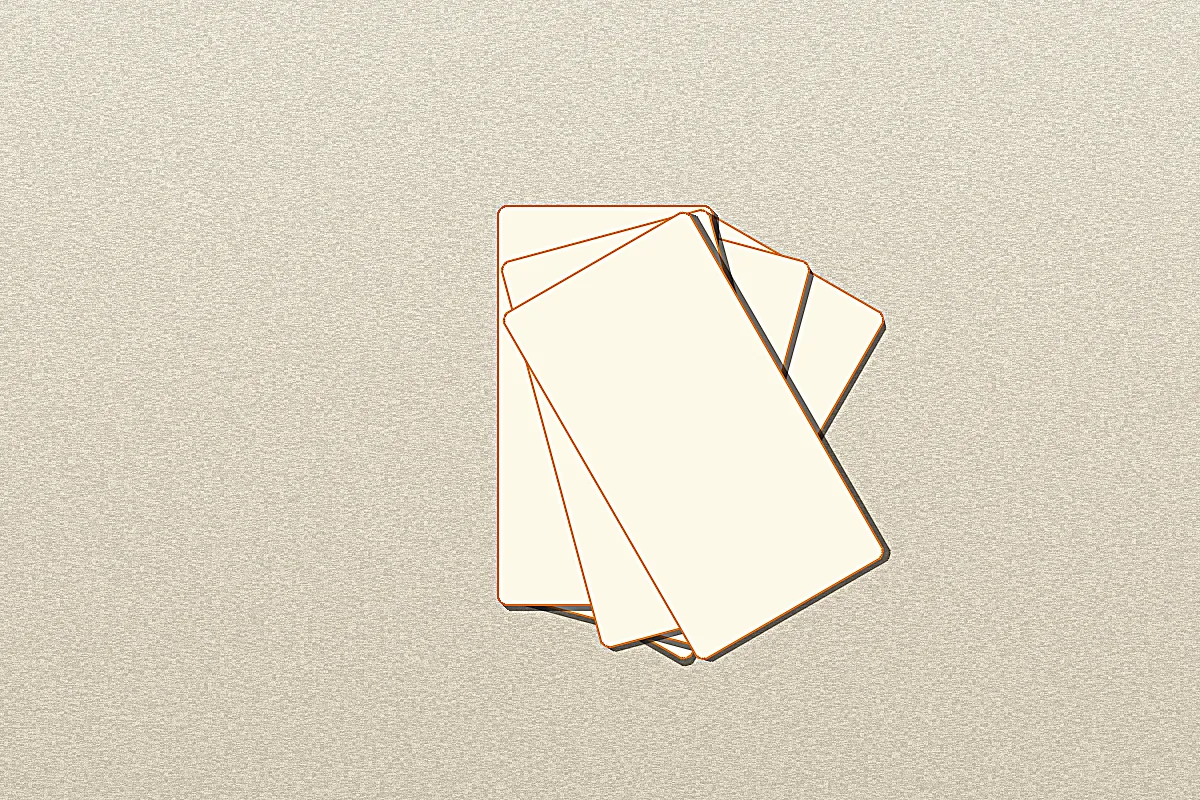 A spread of sorted rummy cards arranged into pure and impure sequences on warm paper